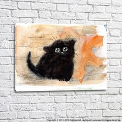 Черный котенок и осенний лист