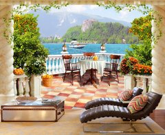 Обеденный стол на террасе с видом на горный пейзаж и море