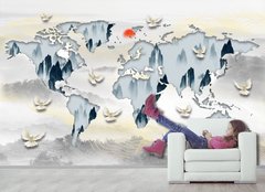 Голуби и карта мира на фоне туманного пейзажа со скалами