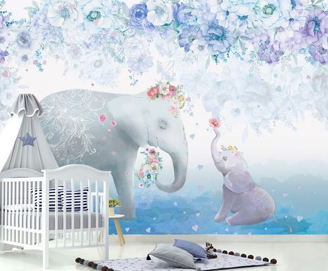 Слониха и слоненок на голубом фоне с цветами