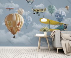 Avioane și baloane cu aer cald pe cer