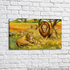 Лев и его семейство на фоне желтой травы
