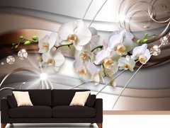 Ветка белой орхидеи на абстрактном фоне со стразами