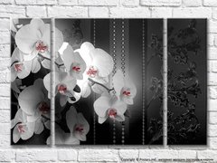 Орхидеи на черном узорчатом фоне
