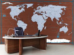 Карта мира с голубыми континентами на коричневом фоне