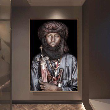 Темнокожий парень в тюрбане, с оружием
