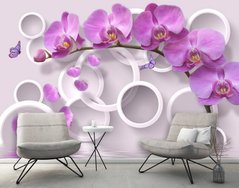 Ramura mare de orhidee violet și un fluture