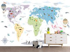 Разноцветные континенты детской карты мира на белом фоне