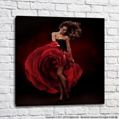 Fată într-o rochie roșie cu vedere la trandafiri, flamenco