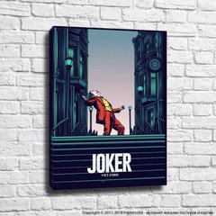 Afiș Joker pe o stradă a orașului printre case