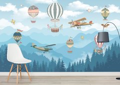 Воздушные шары и самолеты на фоне голубых гор