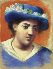 Женщина в шляпе с цветами