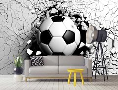 Футбольный мяч и разбитая стена